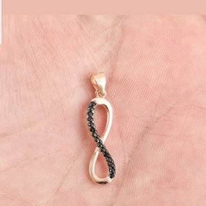 Delicate gold & black onyx infinity pendant